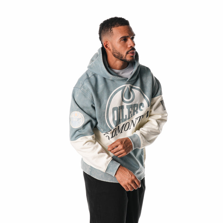 Edmonton Oilers Unisex The Wild Collective Blue & Cream Split Vintage Wash Hoodie