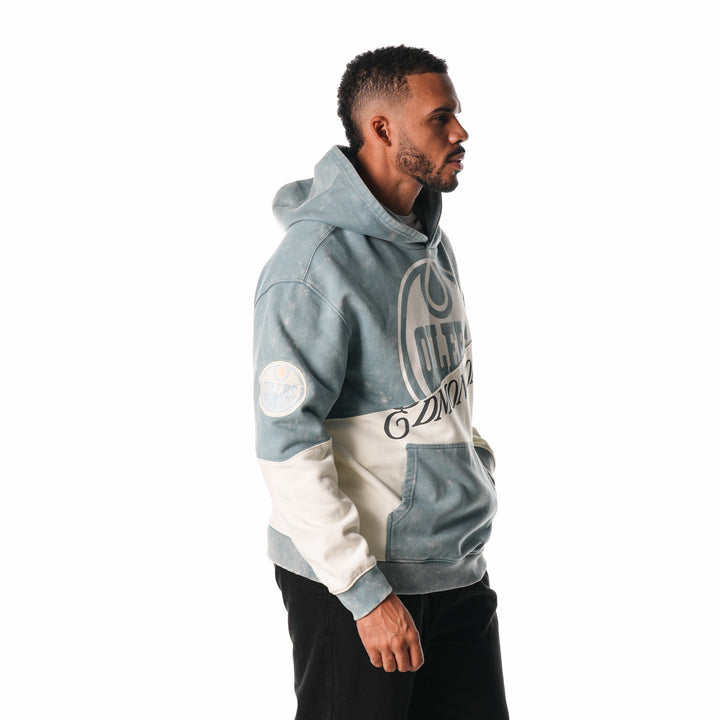 Edmonton Oilers Unisex The Wild Collective Blue & Cream Split Vintage Wash Hoodie