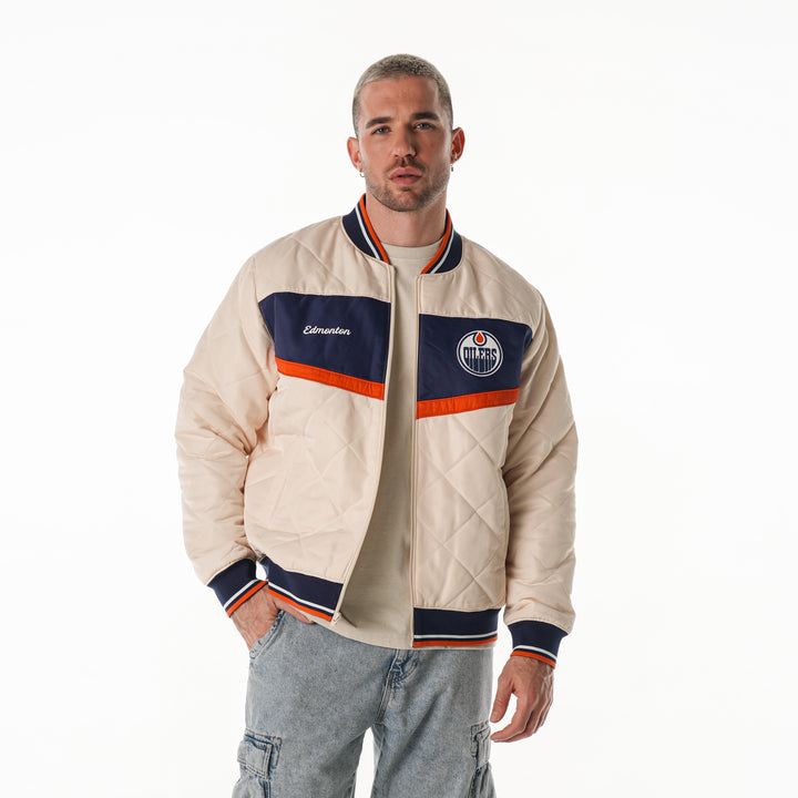 Edmonton Oilers Unisex The Wild Collective Cream Quilted Bomber Jacket