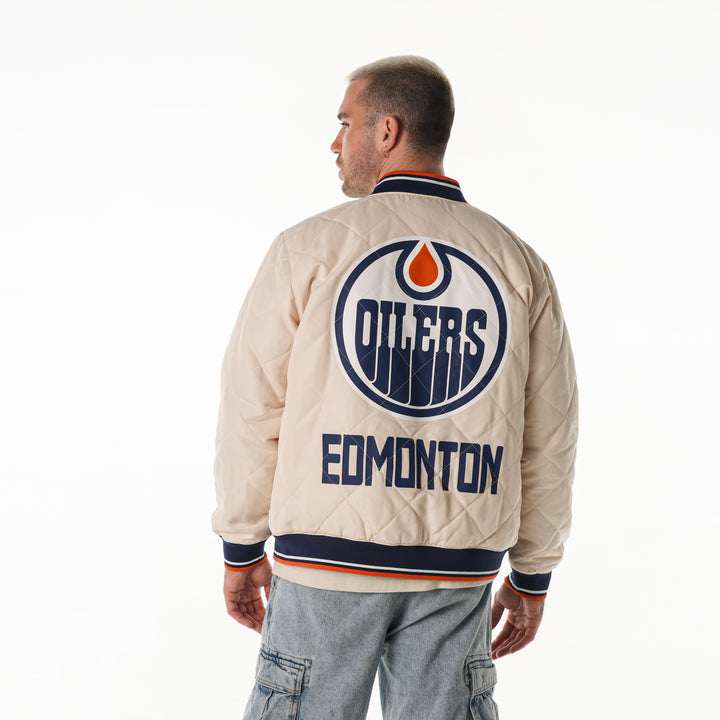 Edmonton Oilers Unisex The Wild Collective Cream Quilted Bomber Jacket