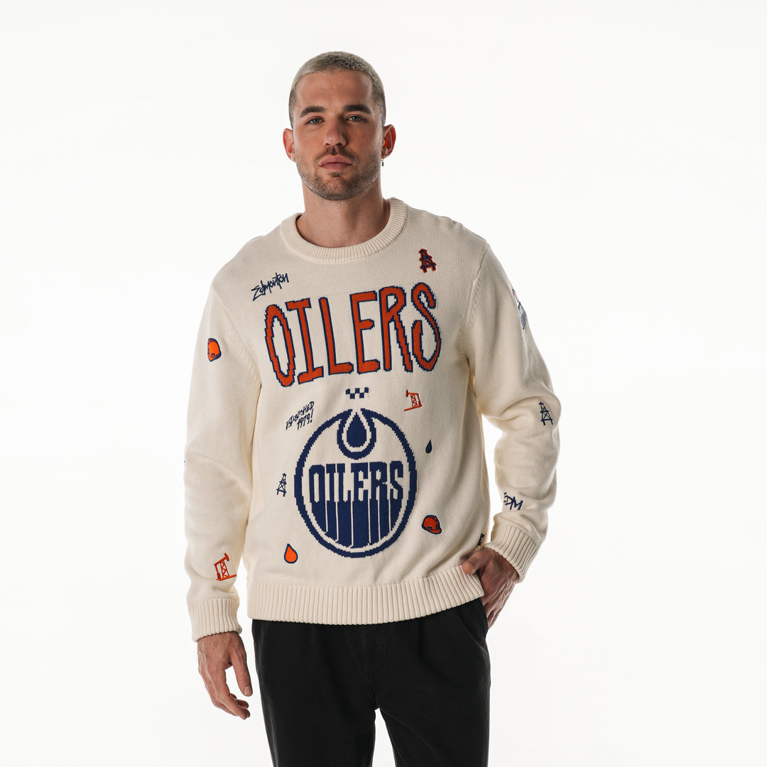 Edmonton Oilers Unisex The Wild Collective Jacquard All Over Cream Crewneck Sweater