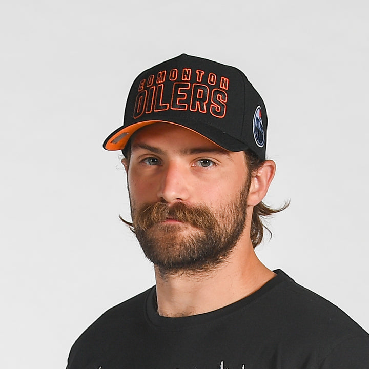Edmonton Oilers Mitchell & Ness Black Classic Act Pro Pinch Snapback Hat