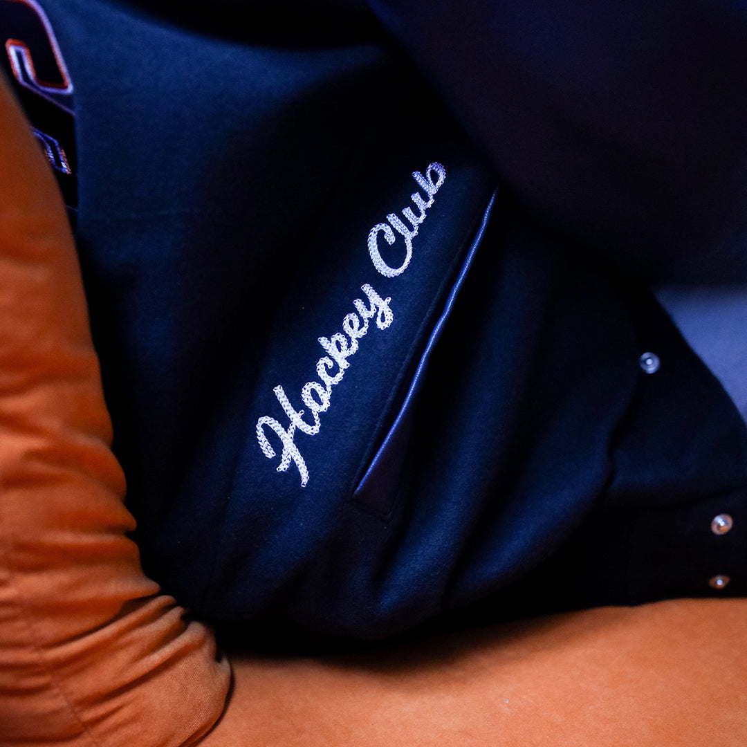 Edmonton Oilers Women's Peace Collective Black & Blue Cropped Varsity Jacket