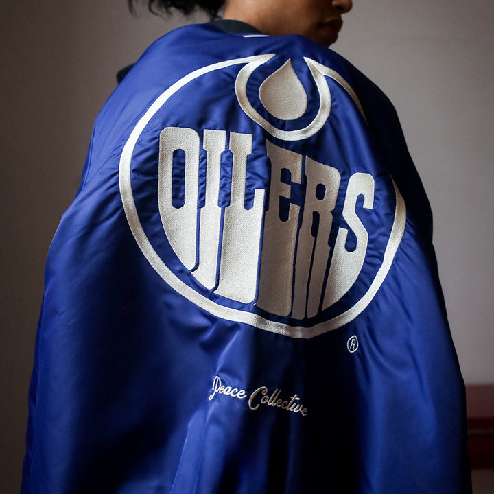 Edmonton Oilers Unisex Peace Collective Blue Vintage Bomber Jacket