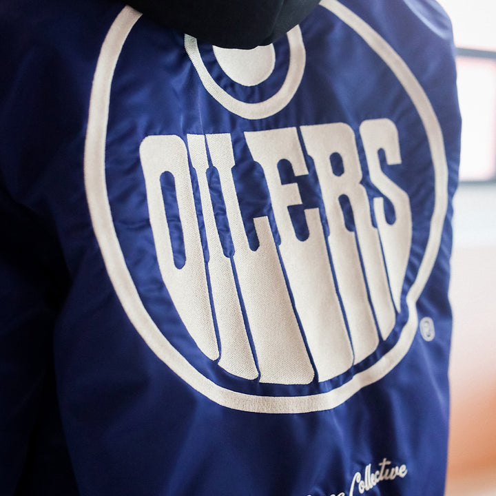 Edmonton Oilers Unisex Peace Collective Blue Vintage Bomber Jacket