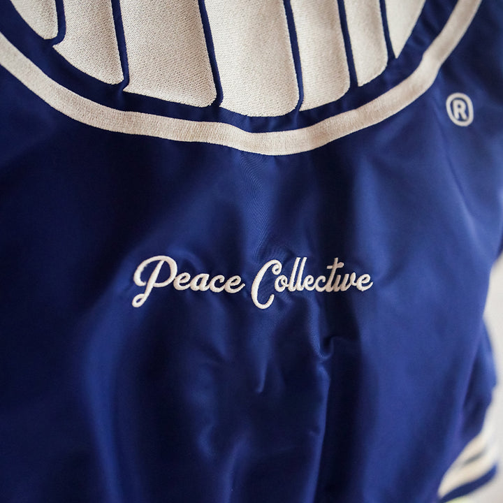Edmonton Oilers Unisex Peace Collective Blue Vintage Bomber Jacket