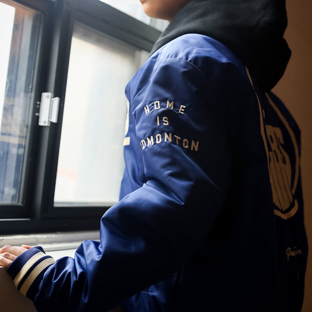 Edmonton Oilers Unisex Peace Collective Blue Vintage Bomber Jacket