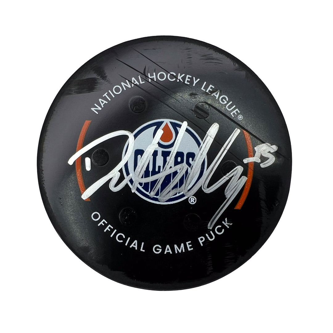 Dylan Holloway Autographed Edmonton Oilers Game Used Puck - Dec. 17/2022 vs Anaheim Ducks