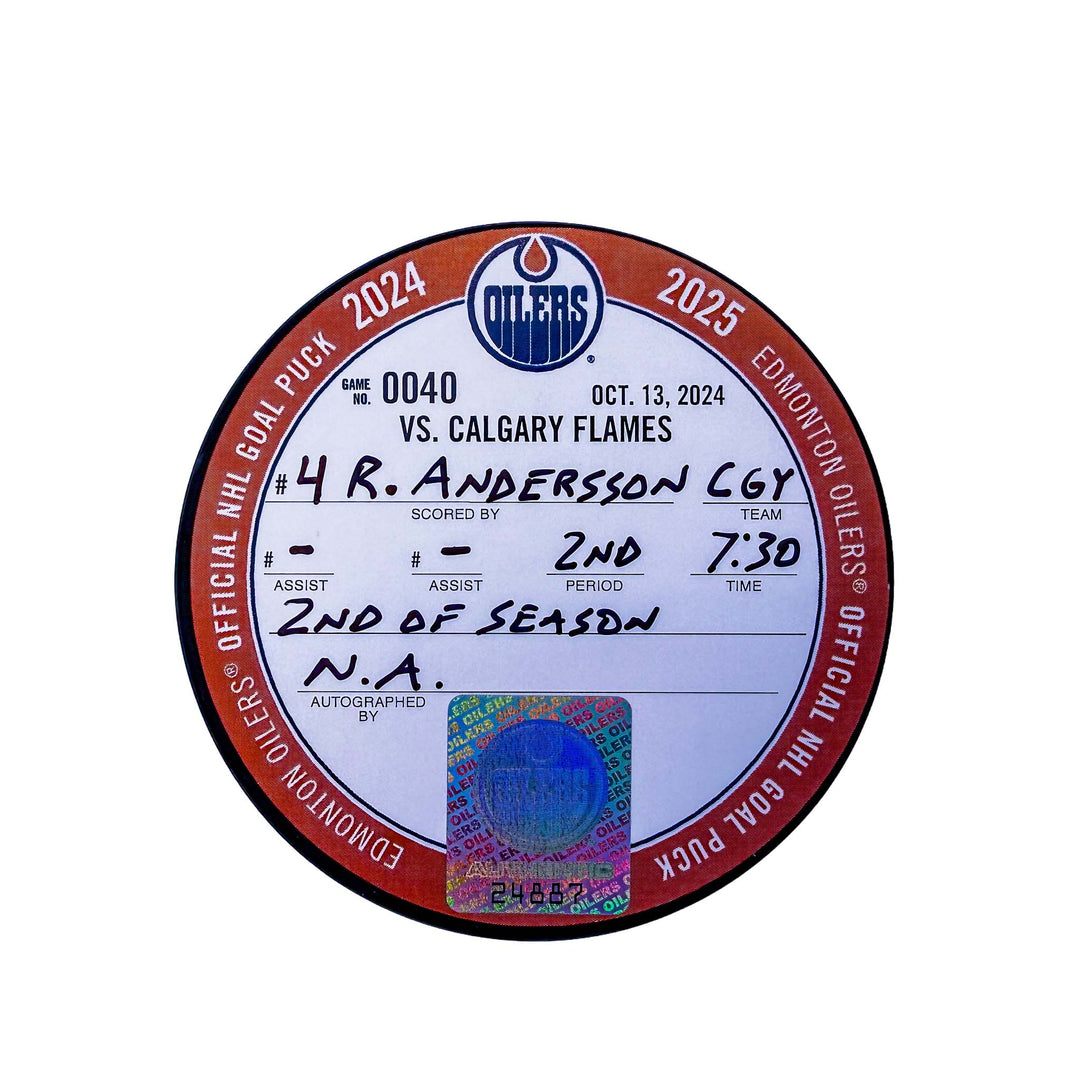 Rasmus Andersson Calgary Flames Goal Puck - Oct. 13/2024 vs Edmonton Oilers #24887