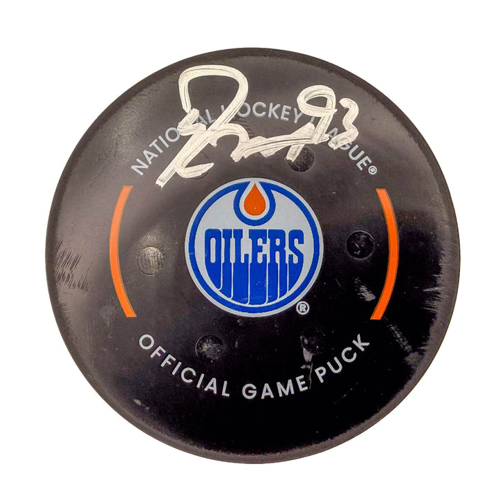 Ryan Nugent-Hopkins Edmonton Oilers Autographed Goal Puck - Jan. 23/2025 vs Vancouver Canucks #24990