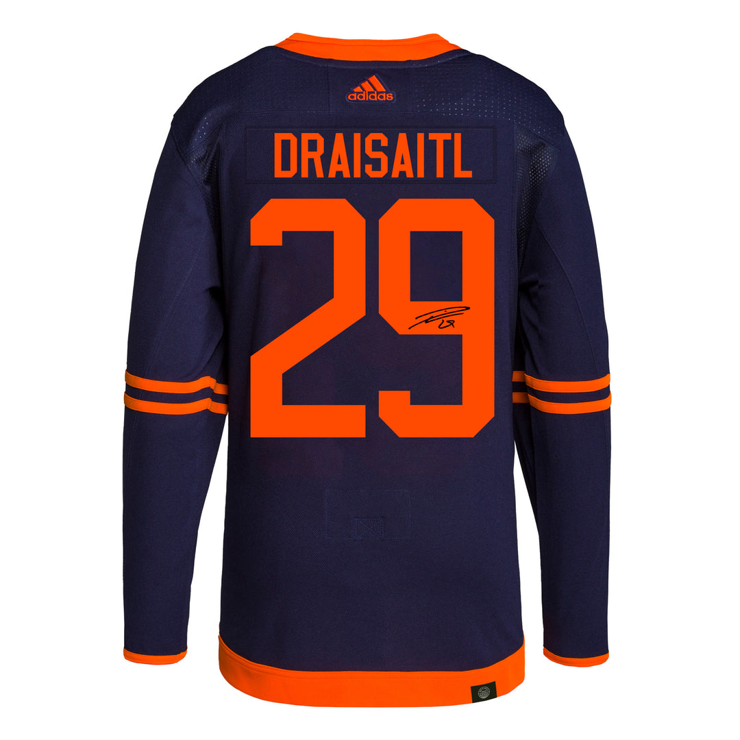 Leon Draisaitl Edmonton Oilers Autographed 16″ x 20″ White Jersey Skating  Spotlight Photograph with Multiple Inscriptions – Limited Edition of 129